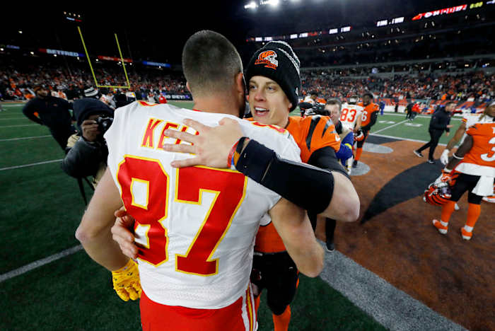 Dec 4, 2022; Cincinnati, Ohio, USA; Cincinnati Bengals quarterback Joe Burrow (9) and Kansas City Chiefs tight end Travis Kelce (87) meet following the game at Paycor Stadium. Mandatory Credit: Joseph Maiorana-USA TODAY Sports